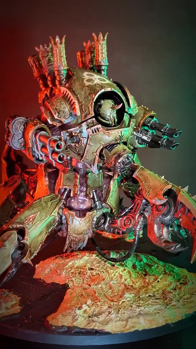 Chaos miniature lit in red and green, spreading Nurgle corruption